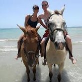 Horse riding on the beach